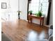 Welcoming living room with hardwood floors, ample natural light, and a staircase at 357 Saturn Pl, Lone Tree, CO 80124