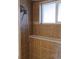 Shower stall showcasing brown tile and window at 357 Saturn Pl, Lone Tree, CO 80124