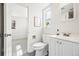 Bright bathroom featuring modern fixtures at 932 Quentin St, Aurora, CO 80011