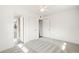 Bright bedroom features neutral tones and soft carpet at 932 Quentin St, Aurora, CO 80011