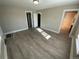 Spacious living area with wood-look floors and access to other rooms at 504 Quitman St, Denver, CO 80204