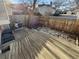 Wooden deck and fenced backyard providing a private outdoor space, with a view of the neighborhood at 7604 S Steele St, Centennial, CO 80122