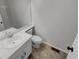 Functional bathroom featuring a single sink vanity, toilet, and practical layout at 7604 S Steele St, Centennial, CO 80122