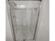 White tiled shower with glass door and dual shower heads is bright and airy at 7604 S Steele St, Centennial, CO 80122