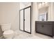 Bathroom with shower, toilet and vanity at 9637 Browns Peak Cir, Littleton, CO 80125
