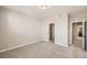 Bedroom with carpet, double closets and access to bathroom at 9637 Browns Peak Cir, Littleton, CO 80125