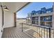 Private balcony with wood deck overlooking community at 9637 Browns Peak Cir, Littleton, CO 80125