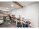 Basement featuring a workspace, drum set, and wooden beam at 9790 City View Dr, Morrison, CO 80465