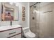 Modern bathroom with glass shower, sleek vanity, and stylish fixtures at 9790 City View Dr, Morrison, CO 80465