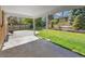 Covered patio overlooking a beautifully landscaped backyard with a tiered garden at 7405 S Jackson Ct, Centennial, CO 80122