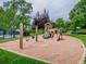 Community playground featuring swings, slides, and climbing structures, creating a fun, safe environment at 7405 S Jackson Ct, Centennial, CO 80122