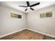 Bright and airy bedroom with hardwood floors and natural light at 1148 Rosemary St, Denver, CO 80220
