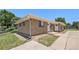Charming brick home featuring a well-maintained front yard and inviting entrance at 1148 Rosemary St, Denver, CO 80220