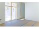 Bright, unfinished bedroom featuring a large window with natural light to create a warm space at 2035 Highlands Dr, Breckenridge, CO 80424