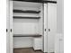 A bright office with built in desk and storage located in the closet at 3184 S Heather Gardens Way # 406, Aurora, CO 80014