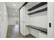 Bright home office with built-in desk and ample storage in the closet at 3184 S Heather Gardens Way # 406, Aurora, CO 80014