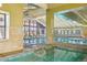 Indoor pool and hot tub with ample space for relaxation and recreation at 3184 S Heather Gardens Way # 406, Aurora, CO 80014