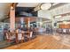 Community clubhouse restaurant with bar and seating at 3184 S Heather Gardens Way # 406, Aurora, CO 80014