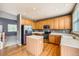 Kitchen with island, stainless steel appliances, and plenty of cabinets at 2856 Penstemon Way, Castle Rock, CO 80109