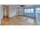 Spacious living room featuring hardwood floors and a large window at 13643 E Exposition Ave, Aurora, CO 80012