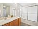 Bathroom with double sinks, shower and tub at 7616 S Sicily Way, Aurora, CO 80016