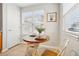 Small breakfast nook with a table for two near a window at 7616 S Sicily Way, Aurora, CO 80016