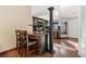 Stylish kitchen with a breakfast bar, dark cabinets, stainless steel appliances, and granite countertops at 9400 E Iliff Ave # 37, Denver, CO 80231