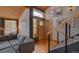 Warm and inviting entryway with wooden accents and staircase at 45 Oak Way, Evergreen, CO 80439