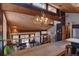 Elevated view of living space with wood ceiling, open to the living and dining area at 45 Oak Way, Evergreen, CO 80439