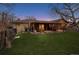 Beautiful backyard with a well-kept lawn, perfect for outdoor activities and relaxation at 615 Estes St, Lakewood, CO 80215