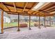 Covered patio, brick flooring, and spacious backyard offer ample room for relaxation and outdoor activities at 615 Estes St, Lakewood, CO 80215