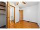 Simple bedroom with closet, and door to bathroom at 615 Estes St, Lakewood, CO 80215