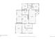Detailed first-floor plan showcasing layout of bedrooms, living spaces, kitchen, and laundry area at 615 Estes St, Lakewood, CO 80215