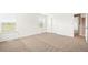 Spacious carpeted bedroom with a view of the outside at 9753 Gatesbury Cir, Highlands Ranch, CO 80126
