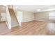 Open living room with staircase at 9753 Gatesbury Cir, Highlands Ranch, CO 80126