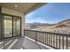 Large deck with sliding glass door and mountain views at 1807 Grayside Cir, Castle Rock, CO 80109