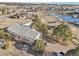 Aerial view of house, detached garage, and expansive lot at 9042 E Wagon Wheel Way, Parker, CO 80138