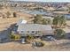 Aerial view of ranch-style home with large deck at 9042 E Wagon Wheel Way, Parker, CO 80138