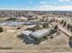 Aerial view showcases home, outbuildings, and neighborhood context at 9042 E Wagon Wheel Way, Parker, CO 80138