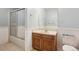 Clean bathroom with shower/tub combo and wood vanity at 9042 E Wagon Wheel Way, Parker, CO 80138