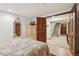 Basement bedroom with access to hallway and stairs at 9042 E Wagon Wheel Way, Parker, CO 80138