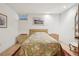 Basement bedroom with floral bedding and wooden nightstands at 9042 E Wagon Wheel Way, Parker, CO 80138