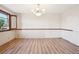 Spacious dining room featuring hardwood floors and a chandelier at 9042 E Wagon Wheel Way, Parker, CO 80138