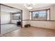 Bright dining room with wood flooring and view to living room at 9042 E Wagon Wheel Way, Parker, CO 80138