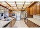 Kitchen with stainless steel appliances and an island at 9042 E Wagon Wheel Way, Parker, CO 80138