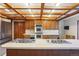 Kitchen boasts double oven, gas cooktop and ample wood cabinets at 9042 E Wagon Wheel Way, Parker, CO 80138