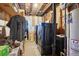 Unfinished laundry room with washer, dryer, and storage at 9042 E Wagon Wheel Way, Parker, CO 80138