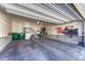 Spacious garage with ample storage, overhead lighting, and concrete flooring at 17548 Bluetrail Ave, Parker, CO 80134