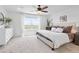 Bright main bedroom with plush carpet, a large window, and neutral tones at 17548 Bluetrail Ave, Parker, CO 80134