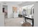Cozy office space with plush carpeting, natural light, and modern decor at 17548 Bluetrail Ave, Parker, CO 80134